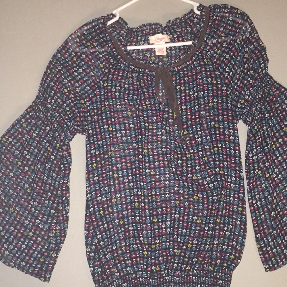 Candie’s sheer flowered top